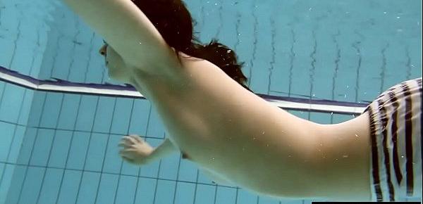  Vera Brass wet and horny in the swimming pool
